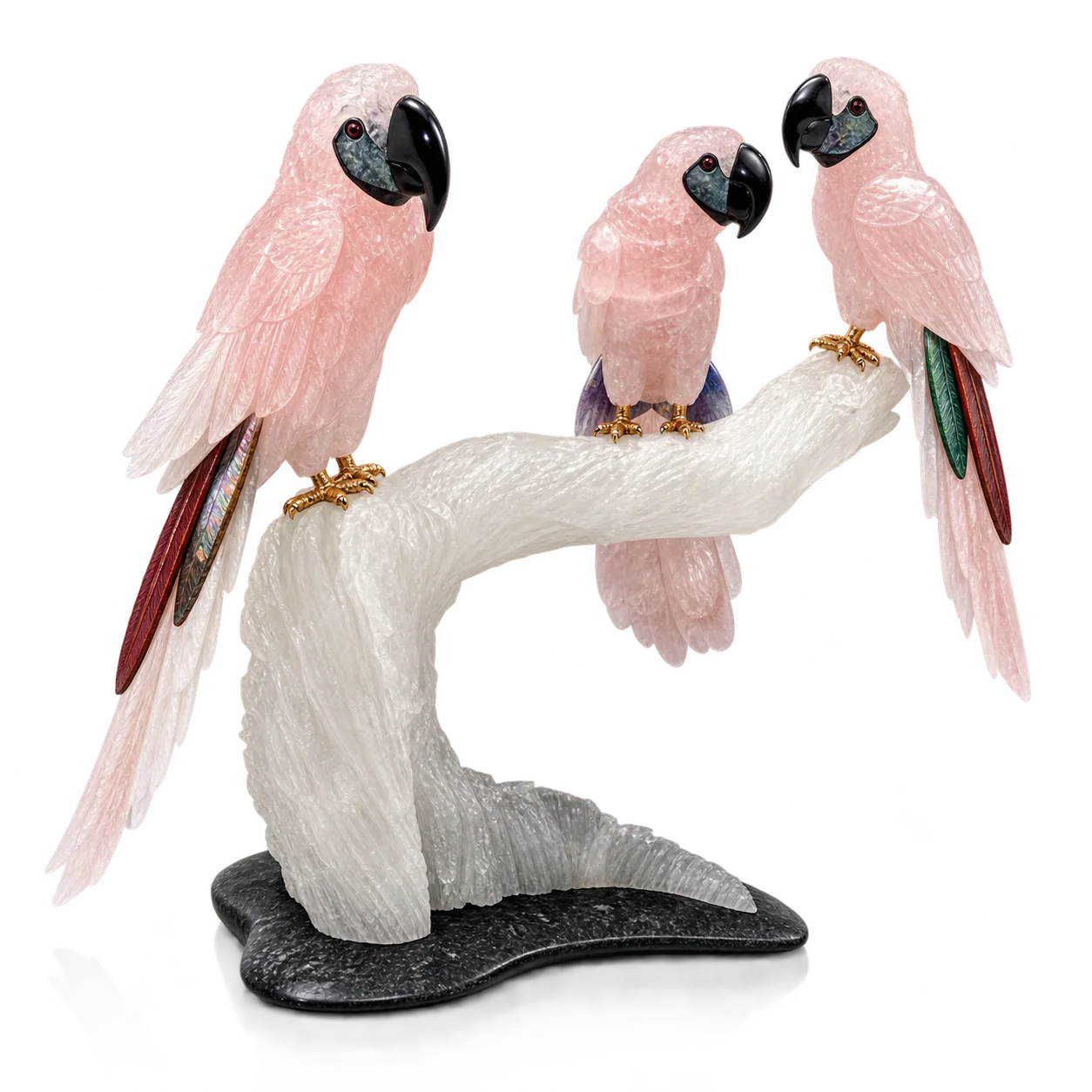 Three rose quartz macaws along a carved branch, one set apart from the other two