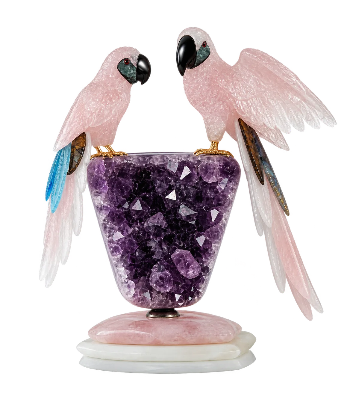Two rose quartz macaws facing each other over an amethyst wedge